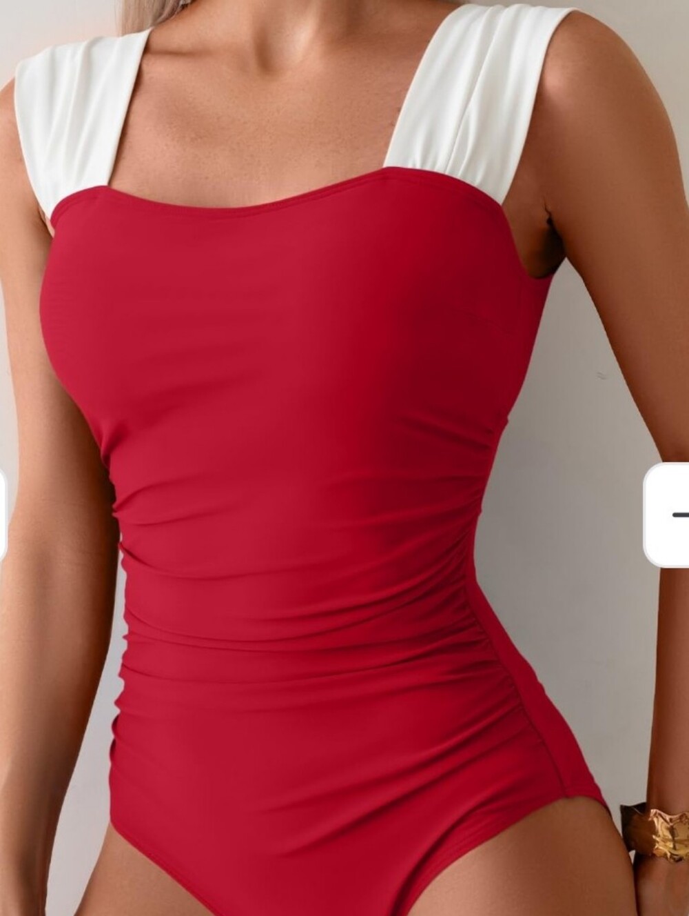 Red women's one piece swimsuit.